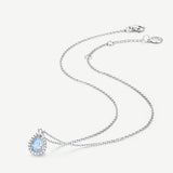Collar de plata con gota y piedra de nacimiento Ojo del océano en aguamarina