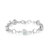Pulsera de tenis de plata de ley FANCIME Halo Corazón con piedra de nacimiento de octubre de ópalo