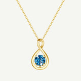 "Abrazo Infinito" Collar con Colgante de Símbolo de Infinito en Plata de Ley con Topacio, Piedra de Nacimiento de Diciembre - Oro
