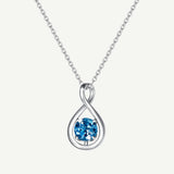 "Abrazo Infinito" Collar con Colgante de Símbolo de Infinito en Plata de Ley con Topacio, Piedra de Nacimiento de Diciembre - Plata