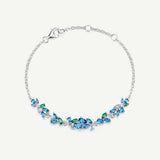 Pulsera de Plata con Barra de Flor “Susurro de Glicina” con Aguamarina y Topacio
