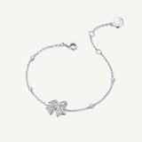 Pulsera de plata de ley con lazo floral mariposa “Blooming Bow” de FANCIME