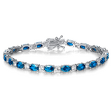 Pulsera de plata de ley con topacio azul talla fancy corte tenis "Glamour Radiance" piedra de nacimiento de diciembre