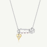 Collar de plata con perla y alfiler de rosa