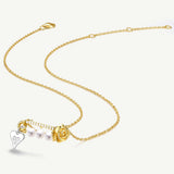 Collar de plata con perla y alfiler de rosa