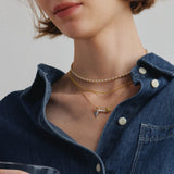 Collar de plata con perla y alfiler de rosa