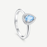 Anillo de plata con piedra de nacimiento Ojo del océano en aguamarina