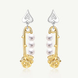 Pendientes de plata con perla y alfiler de rosa