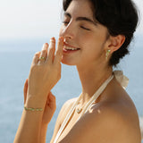 Anillo de Plata con Flor “Susurro de Glicina” con Peridoto