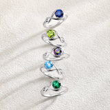 Anillo de Promesa "Abrazo Infinito" con Esmeralda