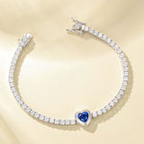 Pulsera de tenis de plata de ley con zafiro de nacimiento de septiembre en corte corazón "Axis" de FANCIME