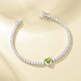 FANCIME "Axis" Pulsera de tenis de plata de ley con peridoto piedra de nacimiento de agosto corte corazón