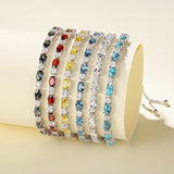 Pulsera de tenis de plata de ley con piedra de nacimiento topacio de diciembre y cadena bolo clásica "Glamour Radiance"