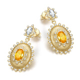 Pendientes de plata de ley con piedra de nacimiento de noviembre en corte oval vintage "Retro Romance" de FANCIME