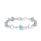 Pulsera de tenis de plata de ley FANCIME Halo Corazón con piedra de nacimiento de marzo de aguamarina