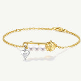 Pulsera de plata con perla y alfiler de rosa