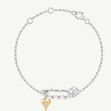 Pulsera de plata con perla y alfiler de rosa