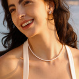 Collar de cadena de plata con flor de perla