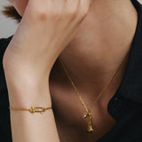 Pulsera de plata con alfiler de rosa