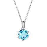 Collar con colgante de piedra de nacimiento aguamarina en oro blanco macizo de 14K y cadena de plata de ley FANCIME "Flor Eterna"