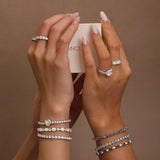 Pulsera de tenis de plata de ley con corte en forma de corazón "Axis" de FANCIME