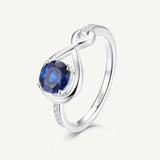 Anillo de Promesa "Abrazo Infinito" con Zafiro