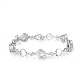 Pulsera de tenis de plata de ley FANCIME Halo Corazón con piedra de nacimiento de abril de circonita cúbica