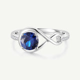 Anillo de Promesa "Abrazo Infinito" con Zafiro