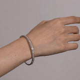 Brazalete rígido de plata de ley FANCIME "Eclíptico"