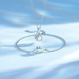 "Abrazo Infinito" Pulsera de plata de ley con símbolo de infinito y piedra de piedra lunar, piedra de nacimiento de junio