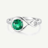 Anillo de Promesa "Abrazo Infinito" con Esmeralda