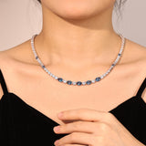 "Glamour Radiance" Collar de tenis de plata de ley con topacio azul tallado elegante, piedra de nacimiento de diciembre