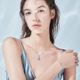 "Abrazo Infinito" Pulsera de plata de ley con símbolo de infinito y piedra de turquesa azul, piedra de nacimiento de diciembre