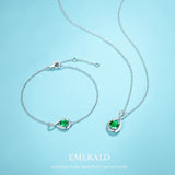 "Abrazo Infinito" Pulsera de plata de ley con símbolo de infinito y piedra de esmeralda, piedra de nacimiento de mayo