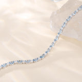 Pulsera de plata de ley con aguamarina talla fancy corte tenis "Glamour Radiance" piedra de nacimiento de marzo