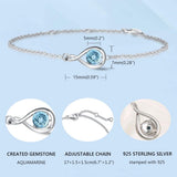 Pulsera de plata de ley con símbolo infinito y aguamarina piedra de nacimiento de marzo "Infinite Embrace"