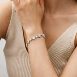 Pulsera de tenis de plata de ley FANCIME "Srta. Encantadora" Halo Corazón con piedra de nacimiento de marzo de aguamarina
