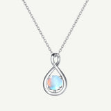 "Abrazo Infinito" Collar con colgante de símbolo de infinito en plata de ley con piedra luna, piedra de nacimiento de junio - Plata