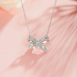 Collar de plata de ley FANCIME "Honey Doll" con lazo y CZ blanca