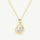 "Abrazo Infinito" Collar con colgante de símbolo de infinito en plata de ley con perla blanca, piedra de nacimiento de junio - Oro