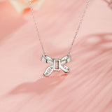 Collar de plata de ley FANCIME "Honey Doll" con lazo y CZ blanca