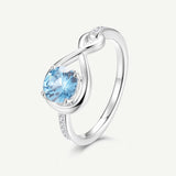 Anillo de Promesa "Abrazo Infinito" con Topacio