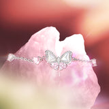 Pulsera de Plata de Ley FANCIME “Beso de Perla” con Lazo de Mariposa