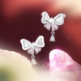 Pendientes de plata de ley con lazo mariposa “Pearl Kiss” de FANCIME