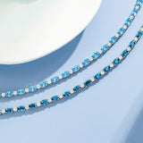 Pulsera de plata de ley con topacio azul talla fancy corte tenis "Glamour Radiance" piedra de nacimiento de diciembre