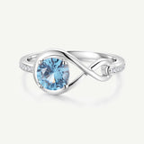 Anillo de Promesa "Abrazo Infinito" con Topacio