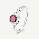 Anillo de Promesa "Abrazo Infinito" con Granate