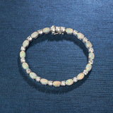 Pulsera de plata de ley con ópalo blanco talla fancy corte tenis "Glamour Radiance" piedra de nacimiento de octubre