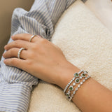 Pulsera de tenis de plata de ley con piedra de nacimiento de agosto y corazón halo FANCIME "Srta. Encantadora"