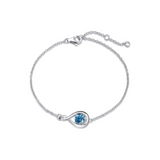 "Abrazo Infinito" Pulsera de plata de ley con símbolo de infinito y piedra de topacio de Londres, piedra de nacimiento de diciembre